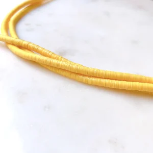 Véritables Perles Heishi 6mm de vinyle Vulcanite africain Jaune poussin